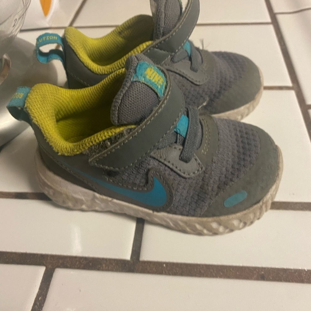 Nike Gray and Blue Sneakers with Breathable Mesh